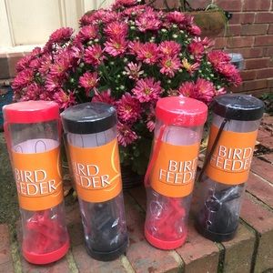 Four Plastic bird feeders. Ready to go! New!